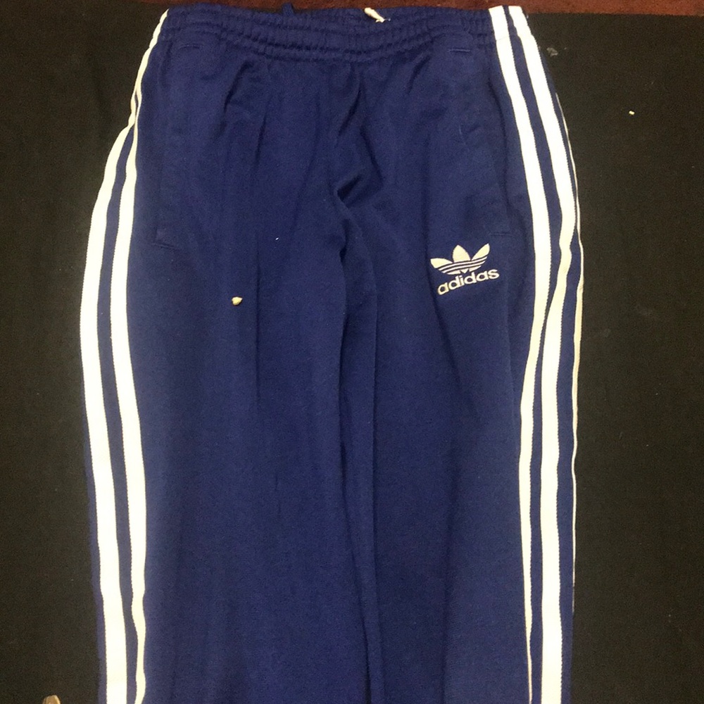 I am selling a blue adidas track sweats .